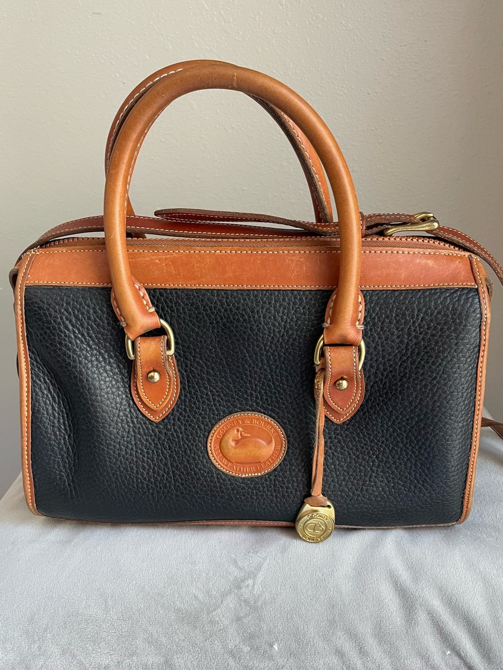 Dooney & Bourke Vintage All Weather Leather Handbag Black Tan Duck Logo AWL